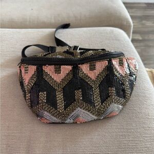 From Saint Xavier Sequin Patterned Fanny Pack Bag (REVOLVE)